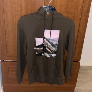 An dark green original Use Hoodie